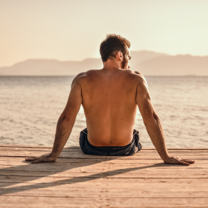 Profhilo man at the beach in sunset